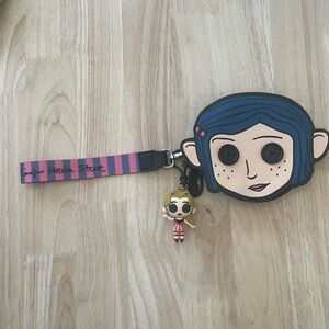 Bioworld Coraline Wristlet with charm.